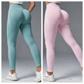 Women's cotton blend yoga pants with mid waist support and hip-tightening design in solid colour.