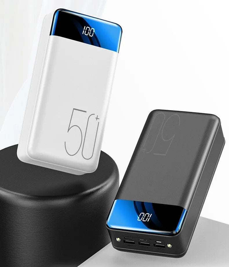 Black and white large 50000mAh portable power bank with three USB ports on the side