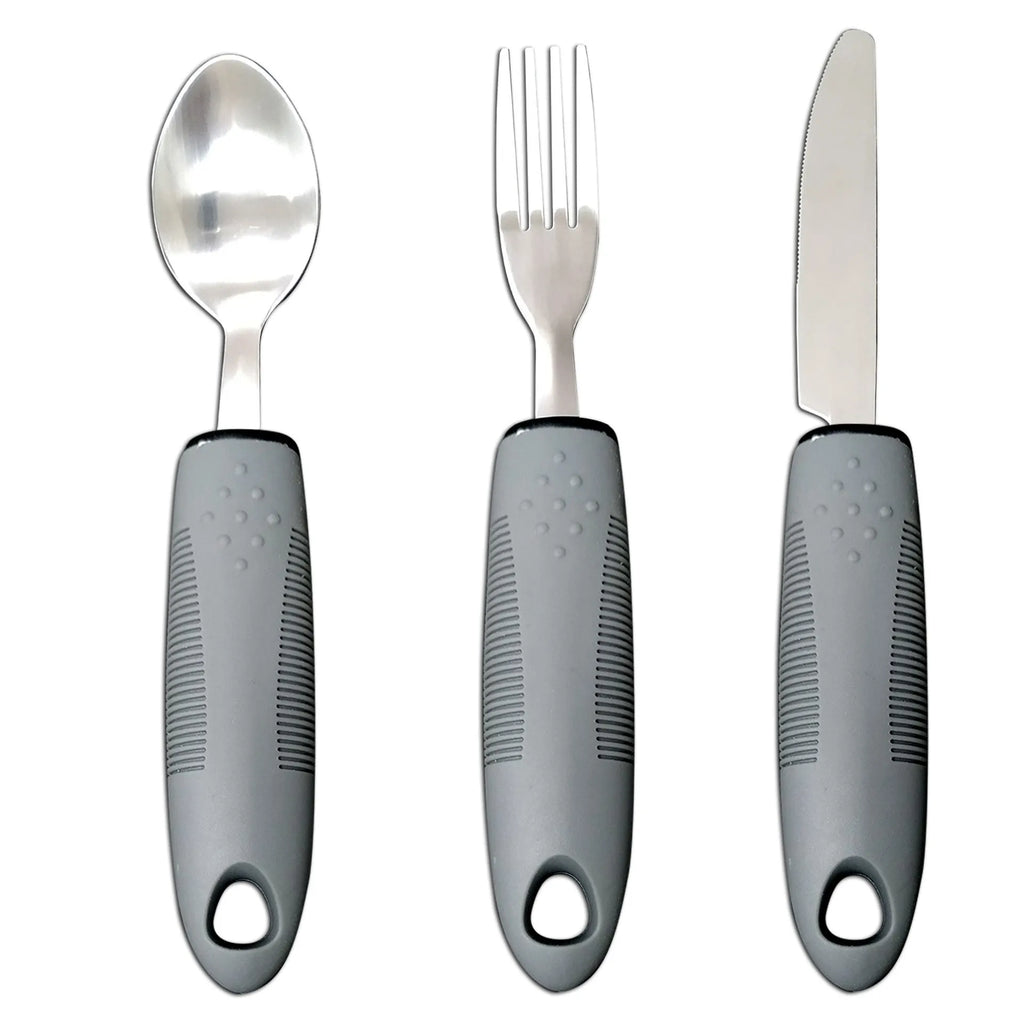 Stainless steel adaptive spoons with black rubber anti-shake handles, part of a rehabilitation cutlery set.