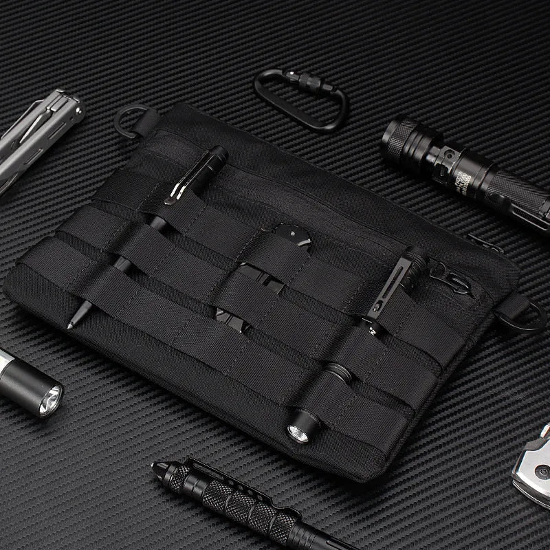 Black Oxford cloth military style outdoor carry bag measuring 18 by 3.5 centimetres