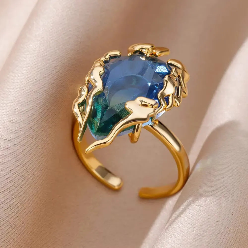 18K gold plated copper open mouth ring with synthetic zircon love emerald motif on white background