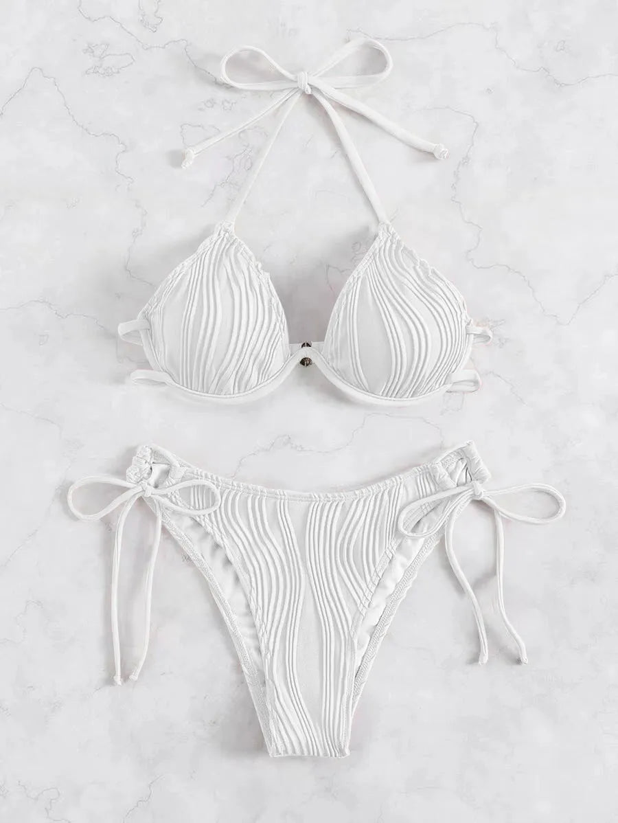 Women's apricot coloured bikini set with underwire cups and adjustable ties.