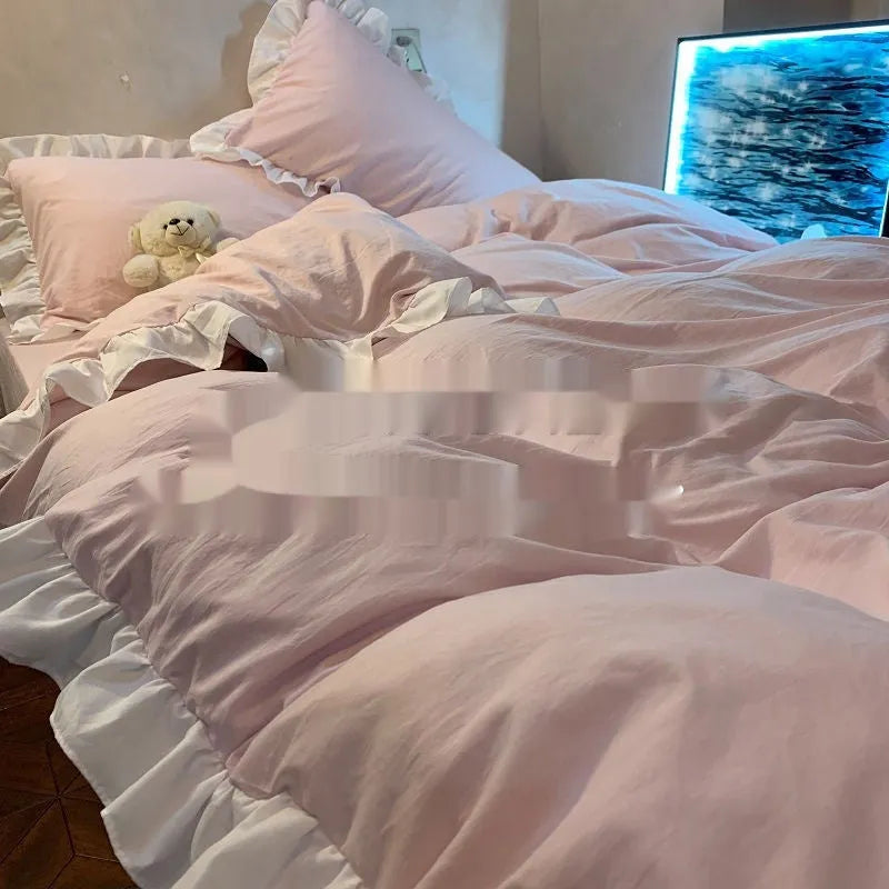 Mori style solid colour quilt cover and pillowcases from a four-piece washed cotton bedding set.