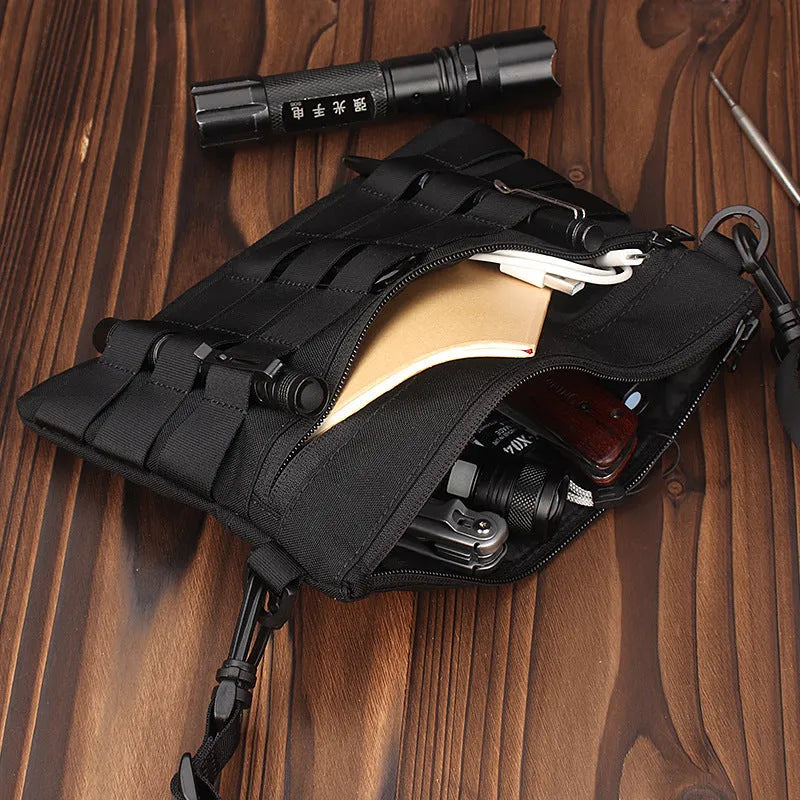 Black Oxford cloth military style outdoor carry bag measuring 18 by 3.5 centimetres