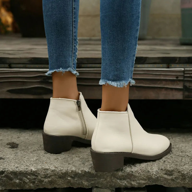 Women's suede ankle boots with side zipper and chunky low heel, in off-white, black, or khaki