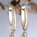 Women's V-shaped geometric ear clips, copper with electroplated champagne gold finish, clip-on style