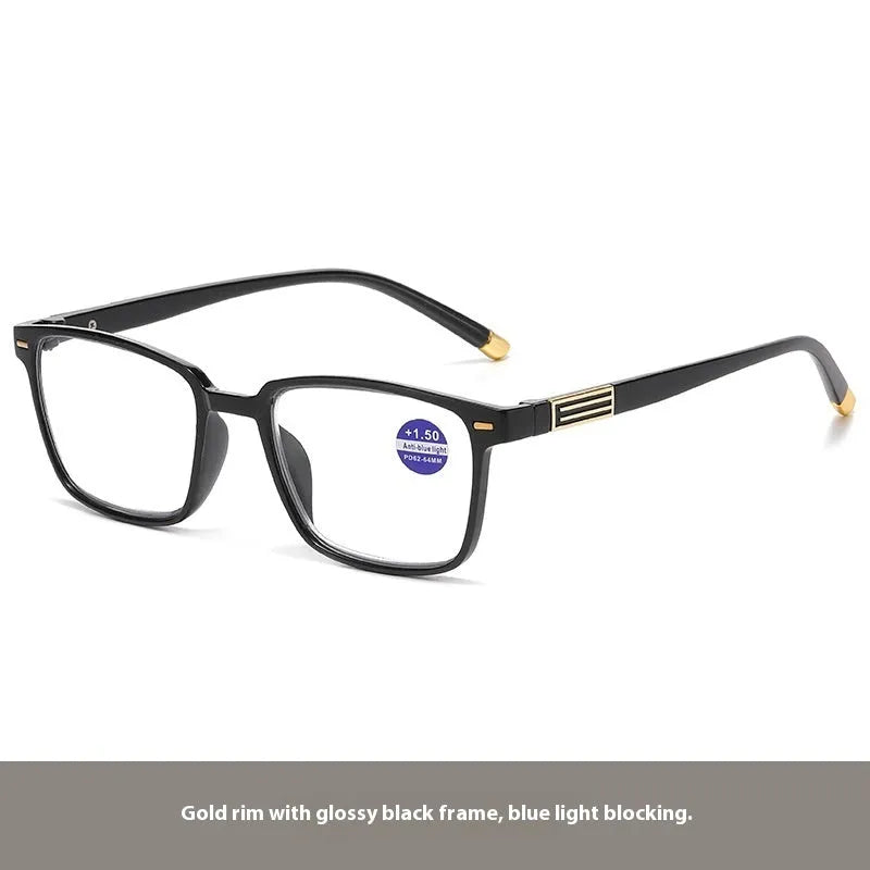 Multifocal blue light reading glasses with photochromic lenses in a black and silver frame style.