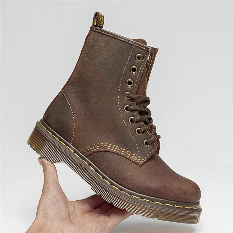 Crazy Horse leather Martin boots with round toe, wedge heel, and front lace-up closure on a white background