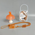 Small pink mushroom-shaped latex gum inside a transparent plastic box with a thin silver chain.