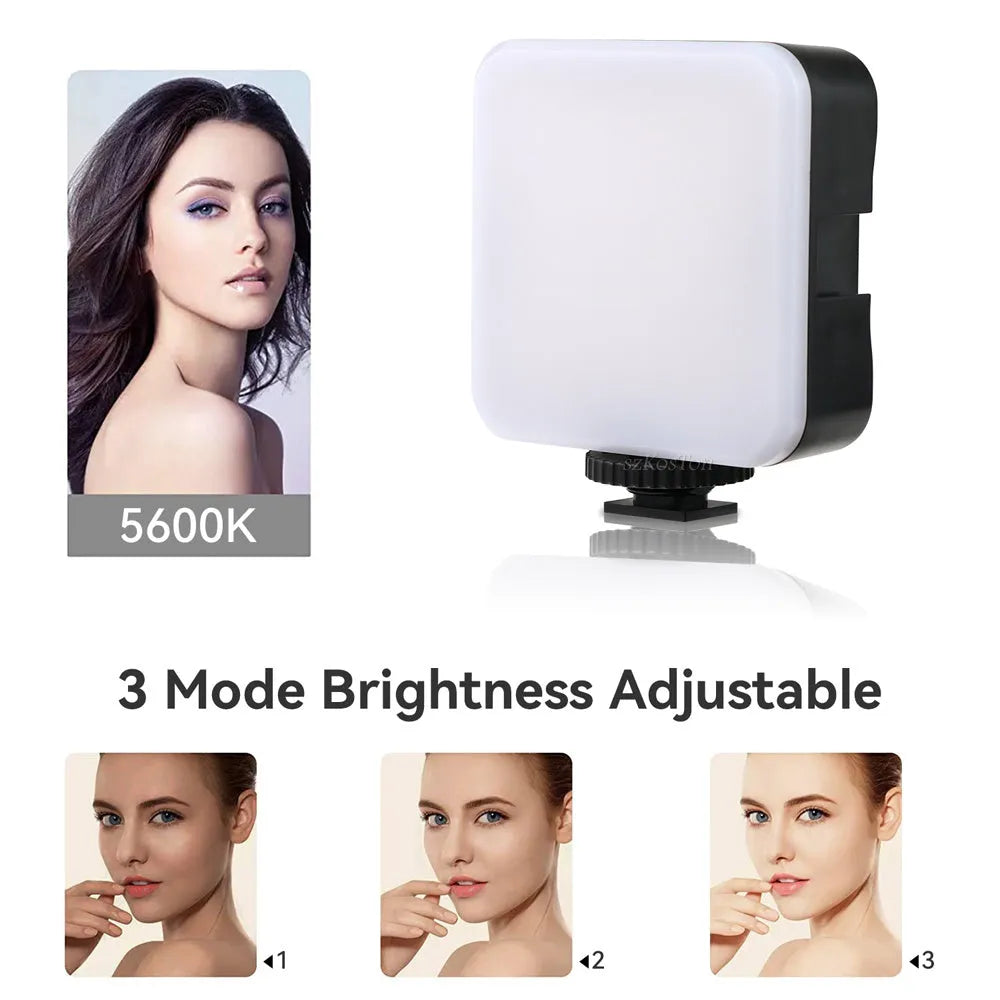 Compact black LED mini square camera flash with rotatable head on a small tripod stand