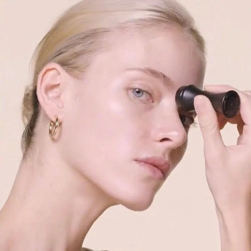 Volcanic stone oil control roller in black, green, pink or white for reusable facial skincare.