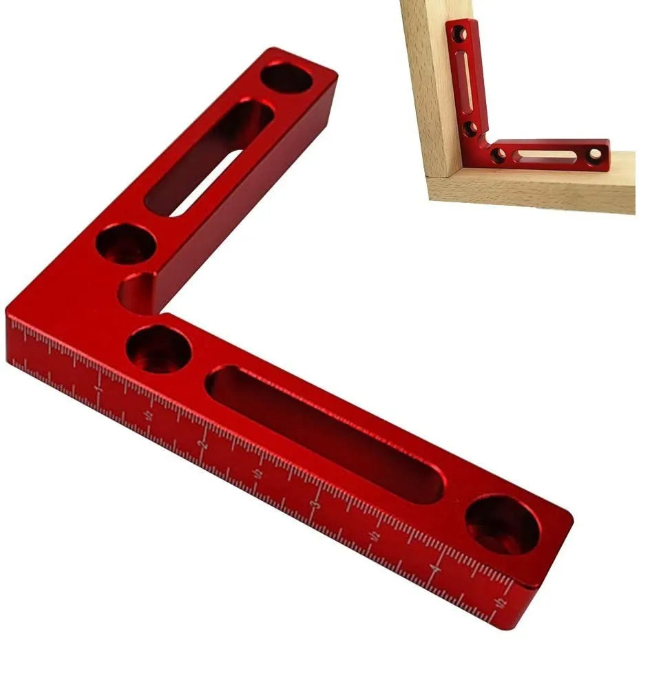 Machined aluminium right angle positioning block for woodworking jigs, showing 90-degree internal corner and scale.