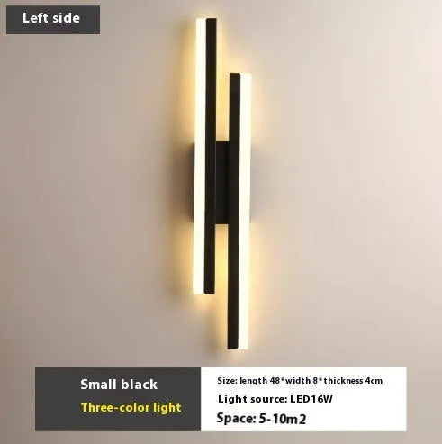 Minimalist Scandinavian-style LED wall light with acrylic shade in black or gold finish