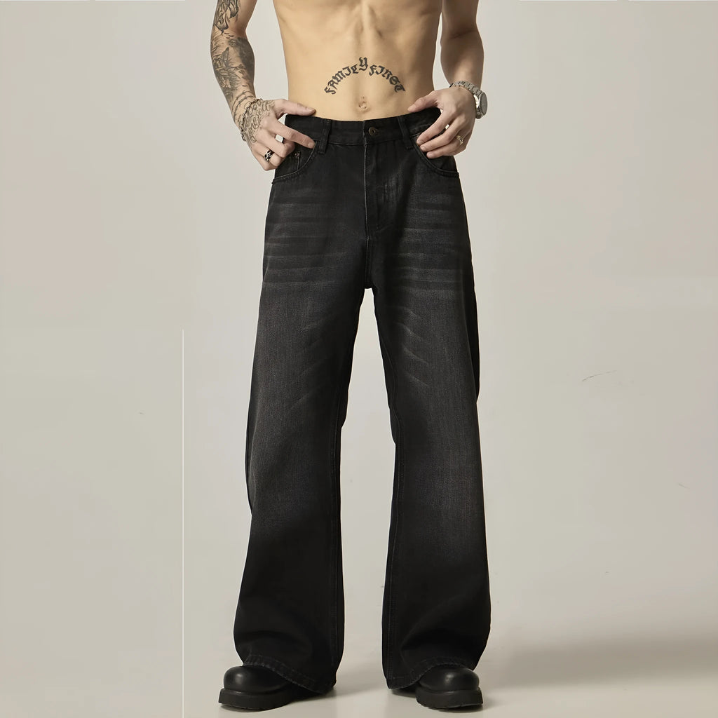 Man's black loose-fit straight-leg retro jeans made from polyester denim fabric.