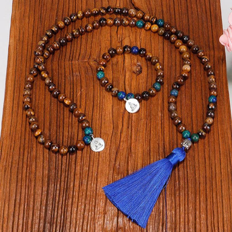 Handmade tiger eye stone bead necklace with Buddha head design, tassel pendant, geometric shape, and 81cm length.