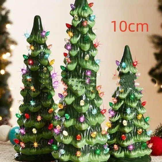 Set of three resin Christmas tree decorations in 20cm, 25cm, and 30cm sizes with LED lights.