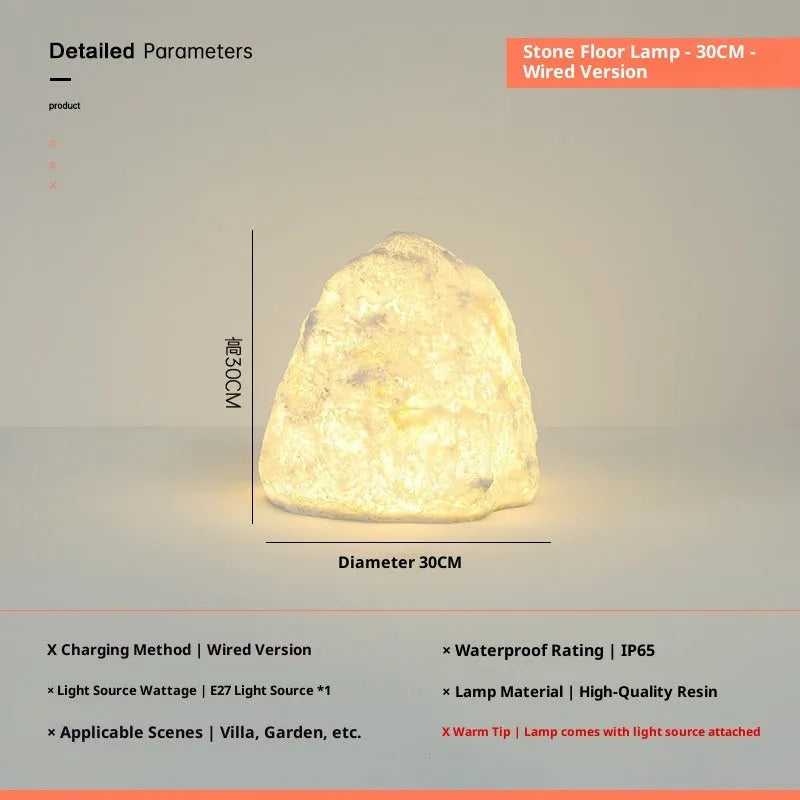 Outdoor waterproof stone resin floor lamp with warm light on garden pathway