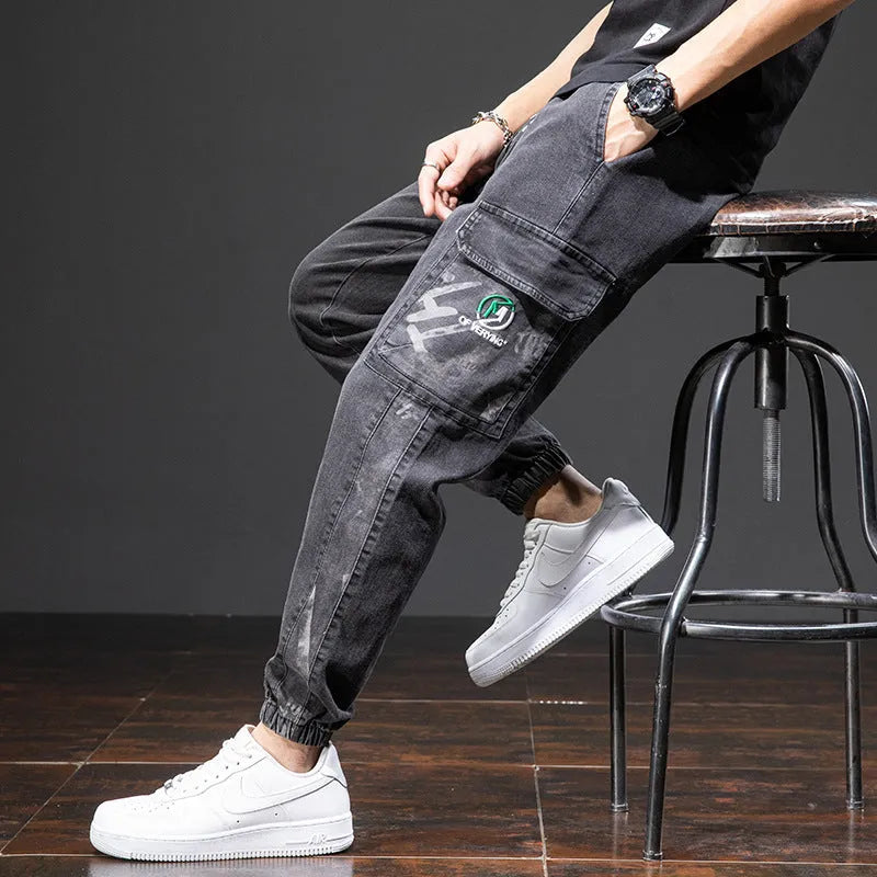 Man wearing loose fit blue cargo jeans with straight leg and cargo pockets
