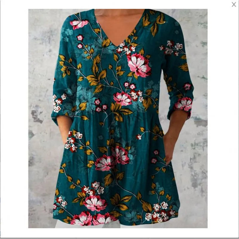 Women's loose fit printed dress with 3/4 sleeves and a wide waist.