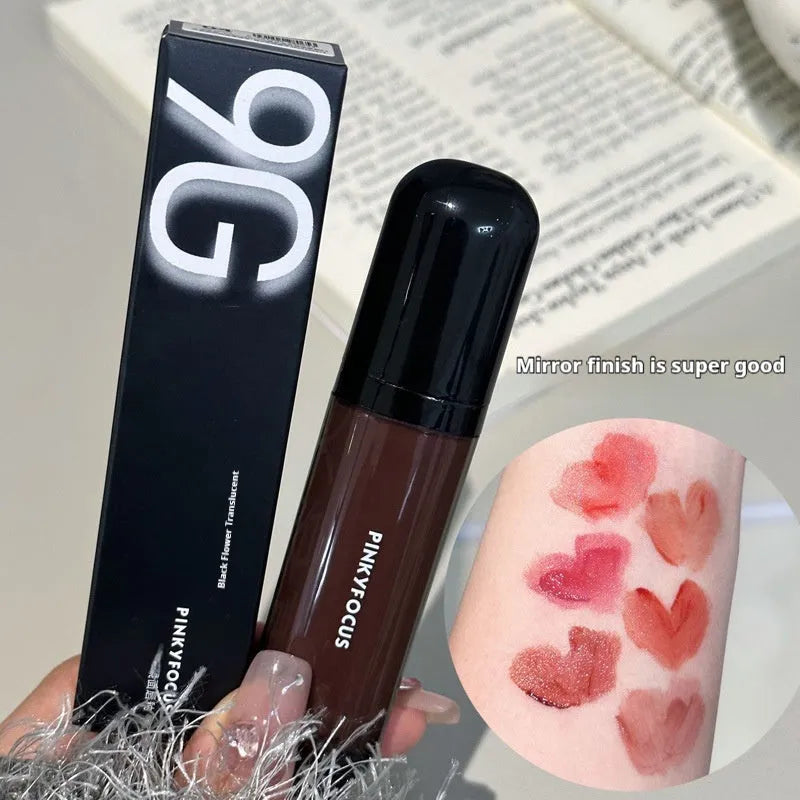 Black shiny mirror lip lacquer tube with glossy finish, shown alongside swatches of its six colour shades.