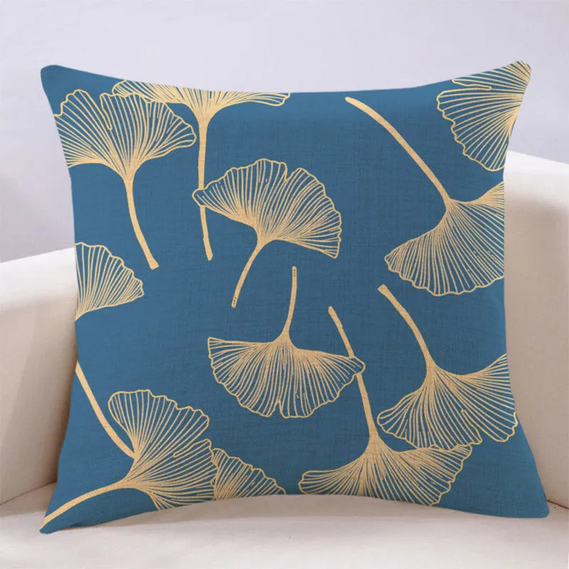 Ginkgo leaf printed square cushion cover on a sofa, available in multiple colours and sizes