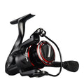 All-metal fishing reel attached to telescopic fishing rod in collapsed position