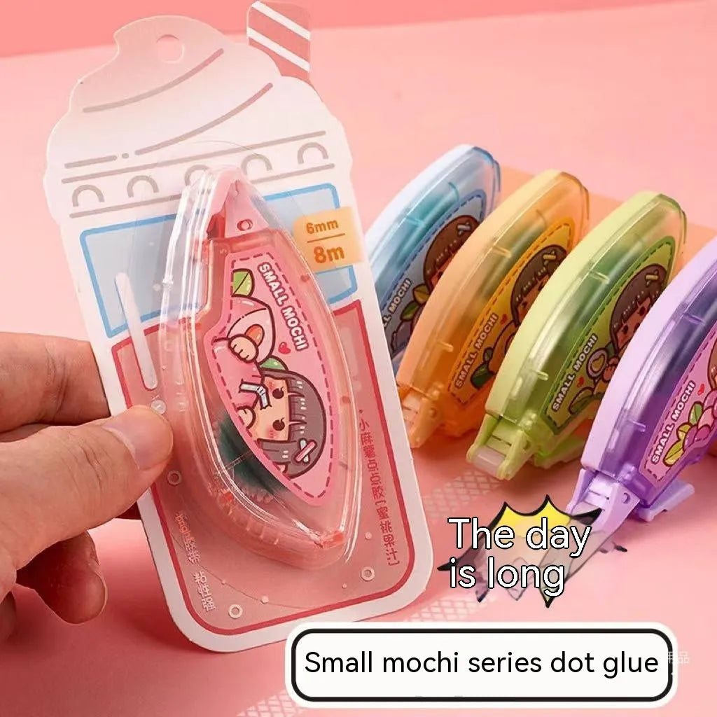 Cute plastic dotting glue in peach juice colour on a card, part of a five-colour traceless adhesive set.