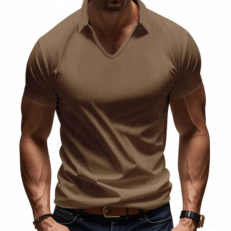 Men's loose fit light grey cotton blend V-neck short sleeve t-shirt laid flat.