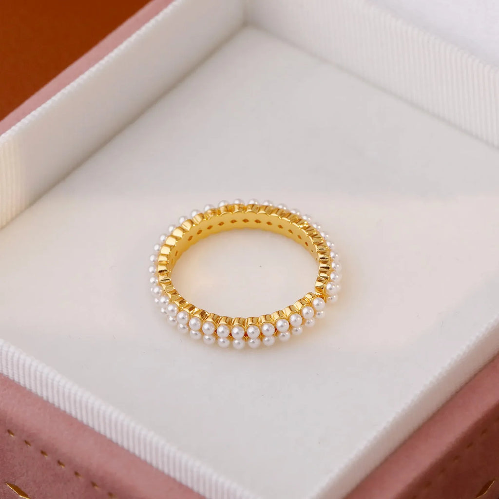 Gold geometric women's ring with open mouth adjustable design and single pearl accent on copper base