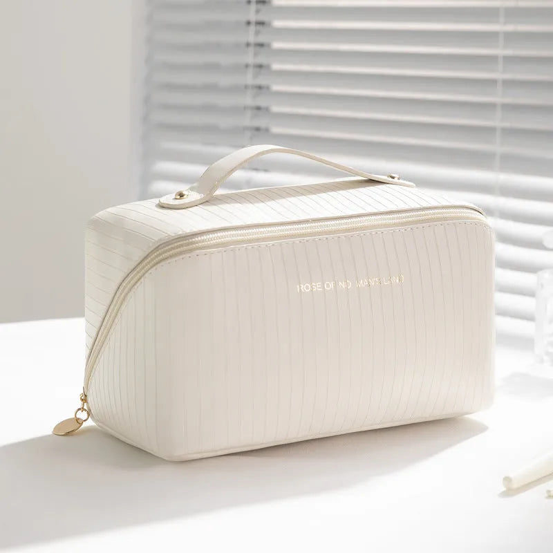 Vertical pattern PU makeup bag showing cubic 22.5cm shape in available colour options