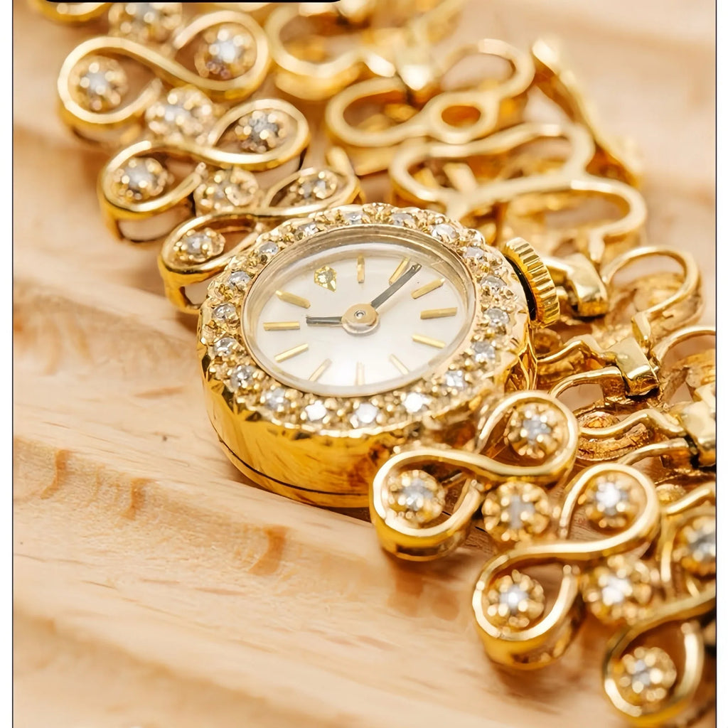 Antique luxury diamond quartz women's watch in gold with 316 stainless steel strap and synthetic sapphire dial