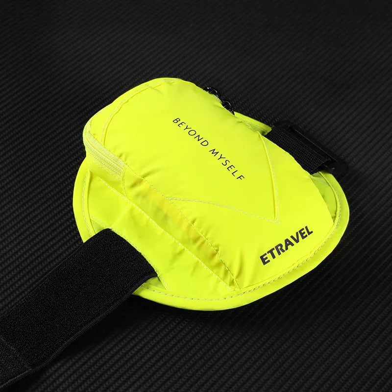Reflective black running arm bag with adjustable strap, holding a mobile phone, shown on a runner's arm.
