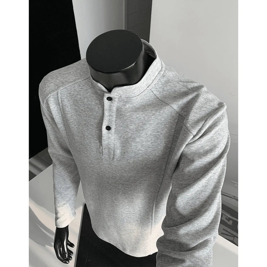 Men's grey asymmetric patchwork polo shirt with a stand-up collar, long sleeves, and a loose fit.