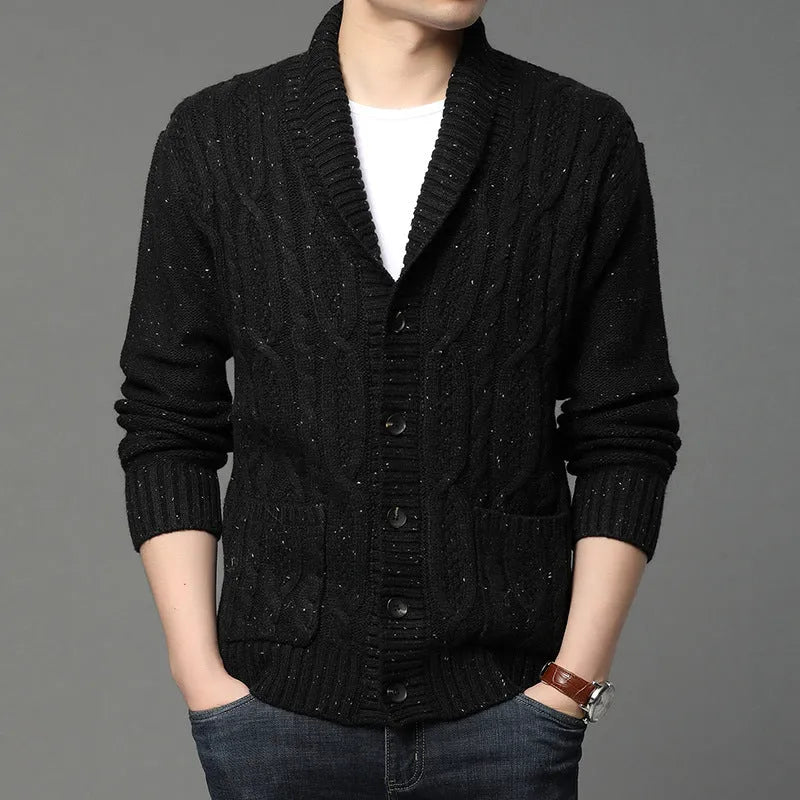 Man wearing a black Korean style jacquard patterned knitted cardigan jacket.
