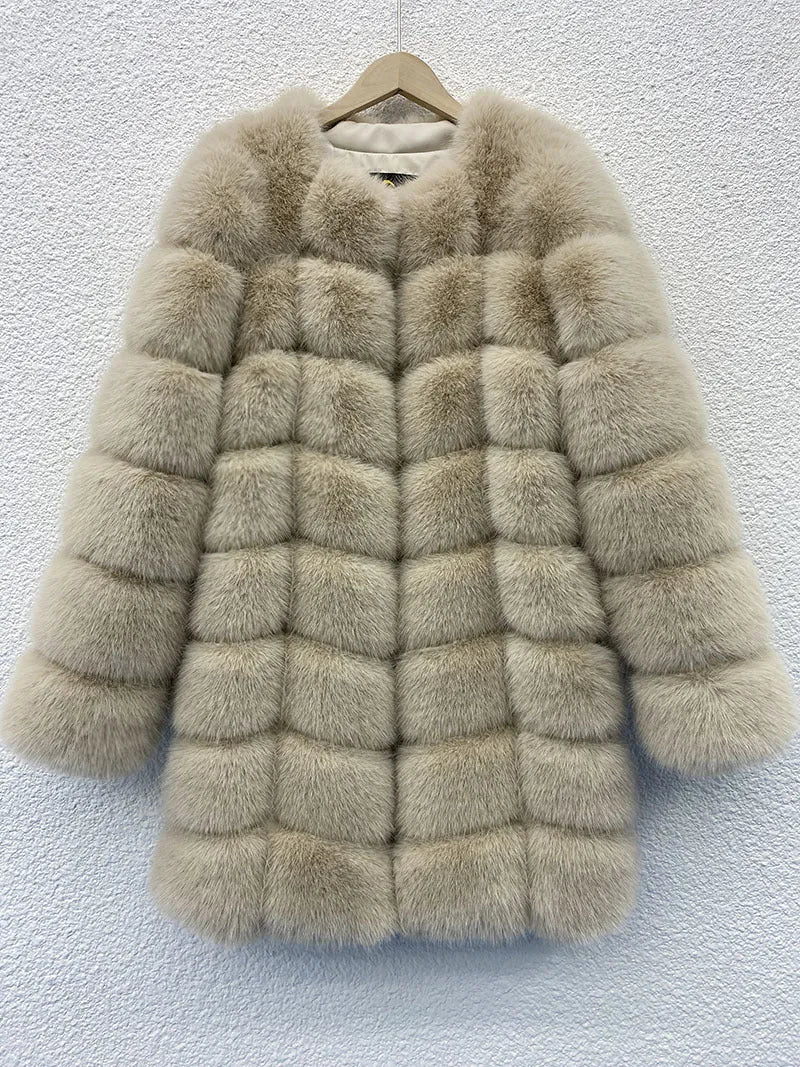 Women's thick black artificial fur coat with regular sleeves on a model.