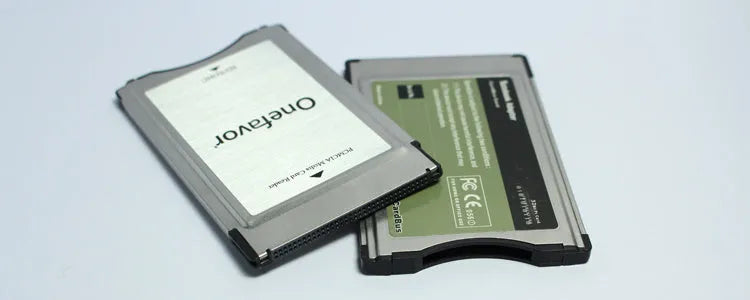 Mercedes-Benz SD to PCMCIA adapter card with stainless steel housing and included 32GB SD card.