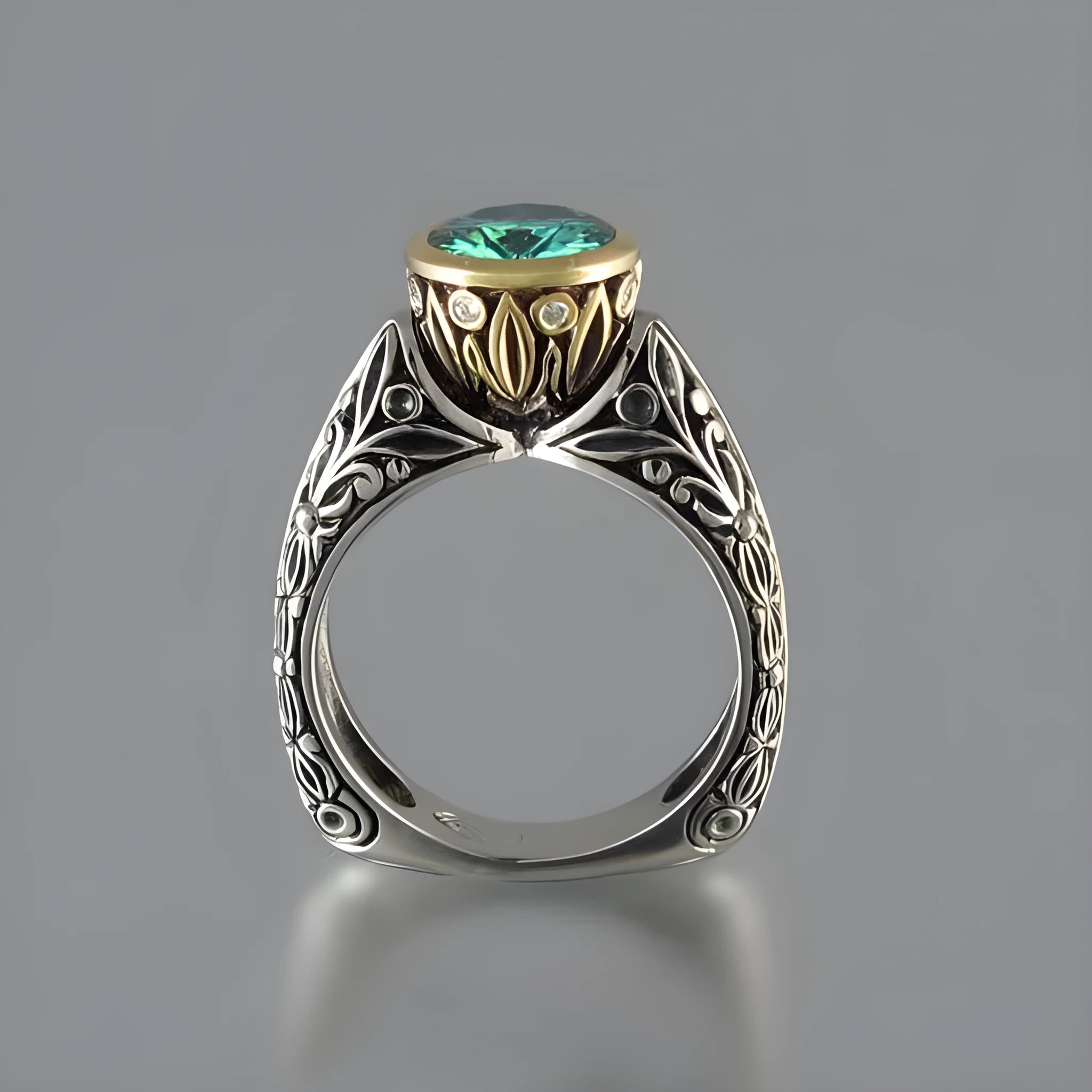Flower-shaped gold-plated ring with green gemstones and colour separation vintage design