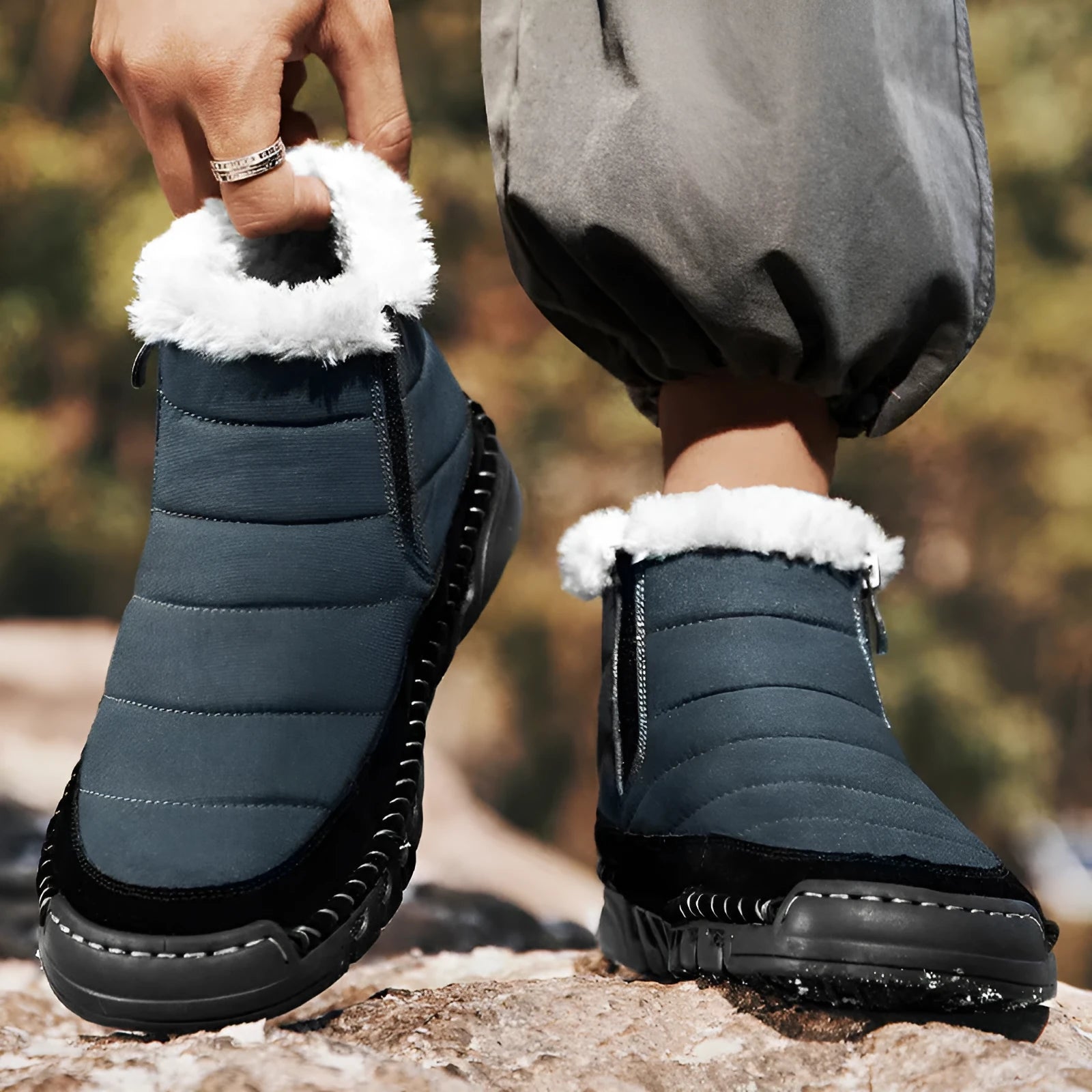Men's plus size solid colour snow boot with round toe and flat heel on a non-slip rubber sole.