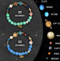 Set of two natural stone beaded bracelets featuring different zodiac sign designs.