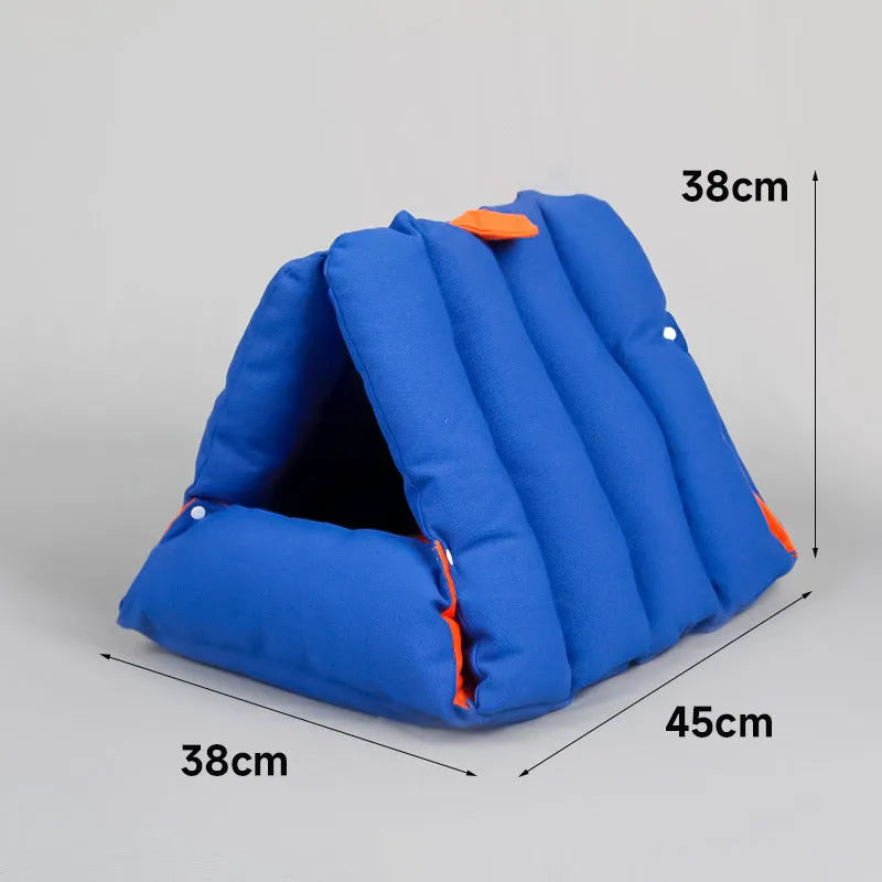 Blue triangular cotton cat bed with drilled holes for stacking, measuring 45x38x38cm