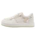 Beige plaid platform sports shoes with mesh lining and a white rubber sole.