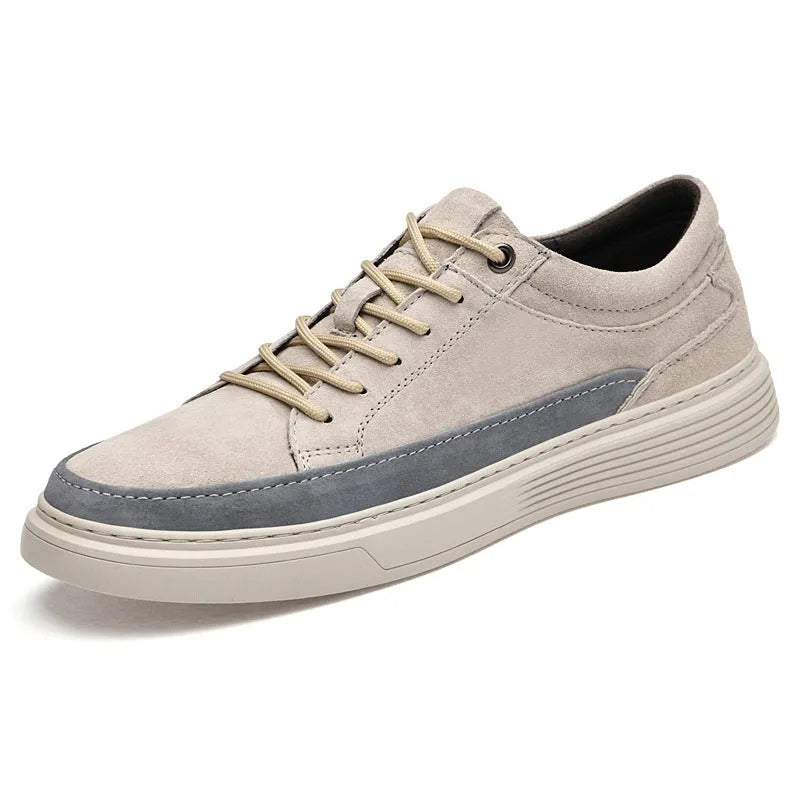 Men's gray casual skate shoes with pigskin upper and rubber sole on a white background.