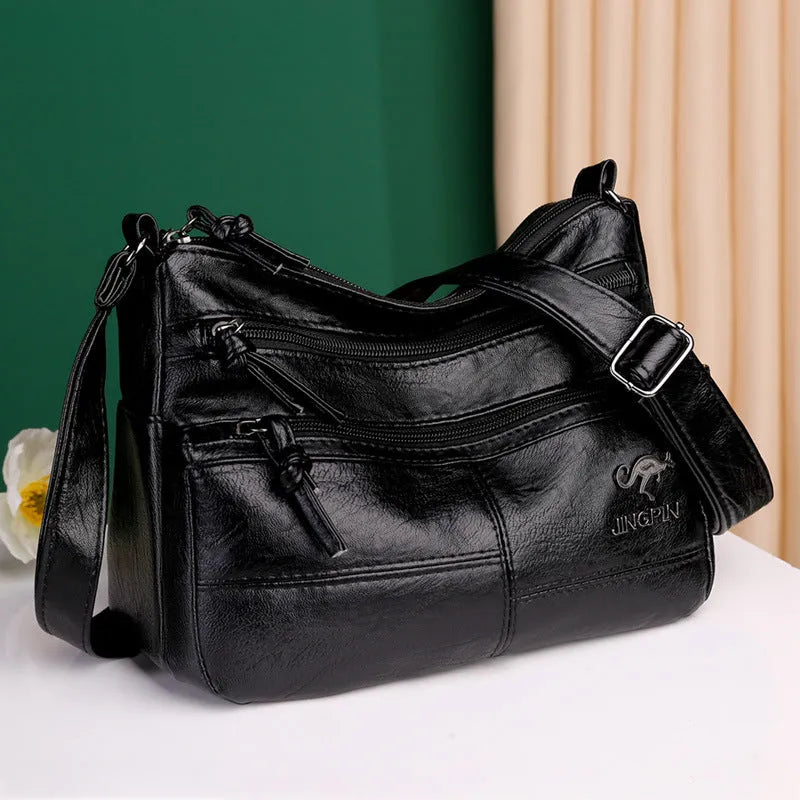 Crossbody shoulder bag in soft textured PU, black, 25x17x9cm, with sandwich pocket