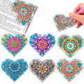 Six frameless PU leather cornerite bookmarks with crystal flower designs on a surface.