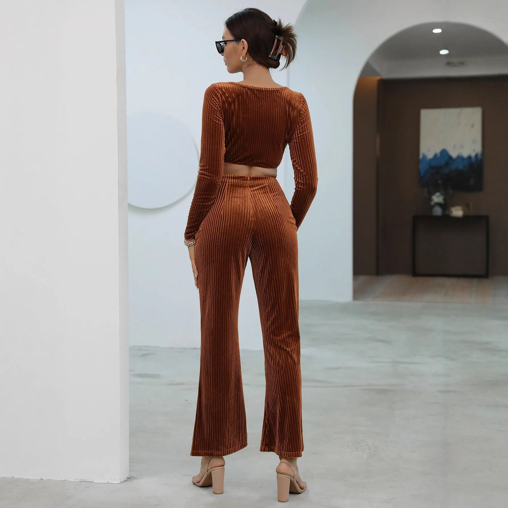 Caramel coloured long sleeve top and matching trousers laid flat, a casual two-piece sweater set.