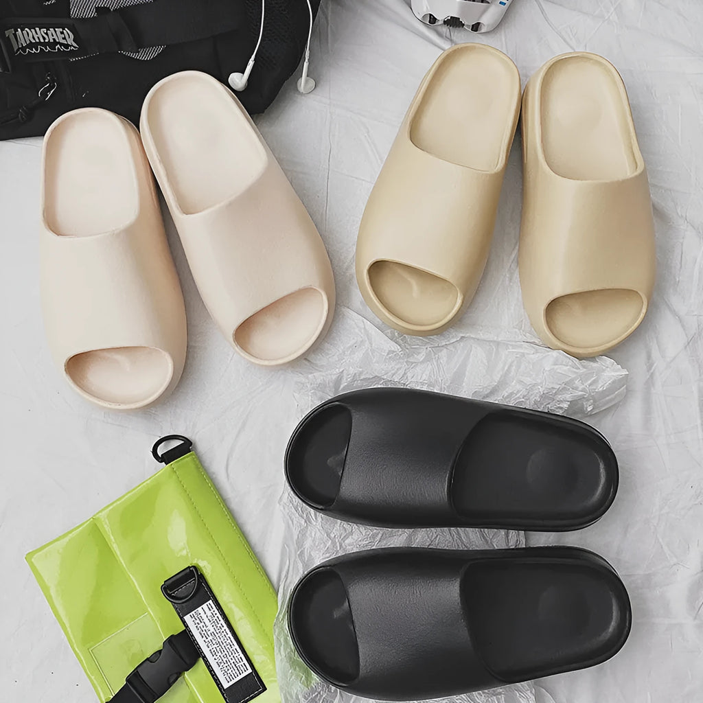 Women's thick-soled beach slippers in beige, black, brown, or green colours on an EVA injection moulded sole.