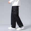 Boys cargo pants with multiple large pockets and drawstring waist in straight leg fit