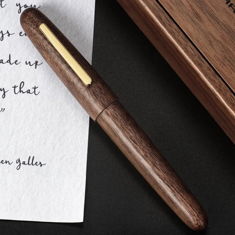 Wooden pen with rotating cap showing seven wood options and four nib types for business writing