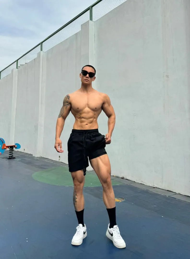 Men's ice silk quick-drying double-layer shorts in six colours with quarter-length design