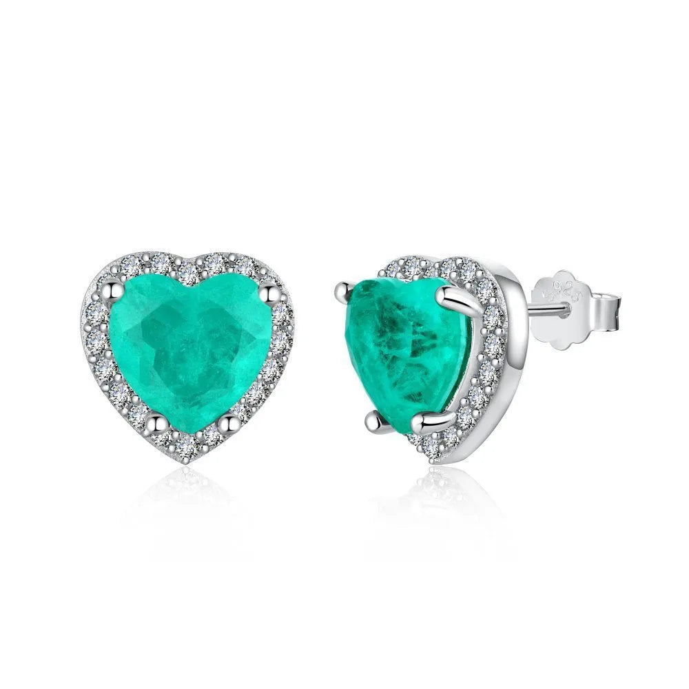 Green platinum 925 silver heart stud earrings on white background